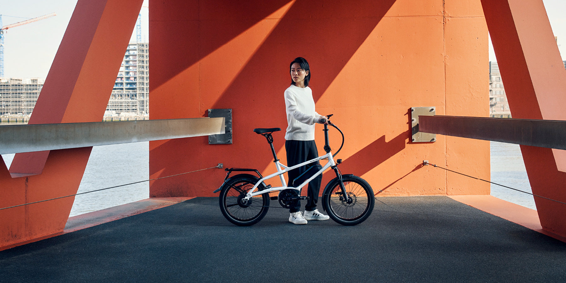Woman with a Riese and Muller Tinker2 electric bike