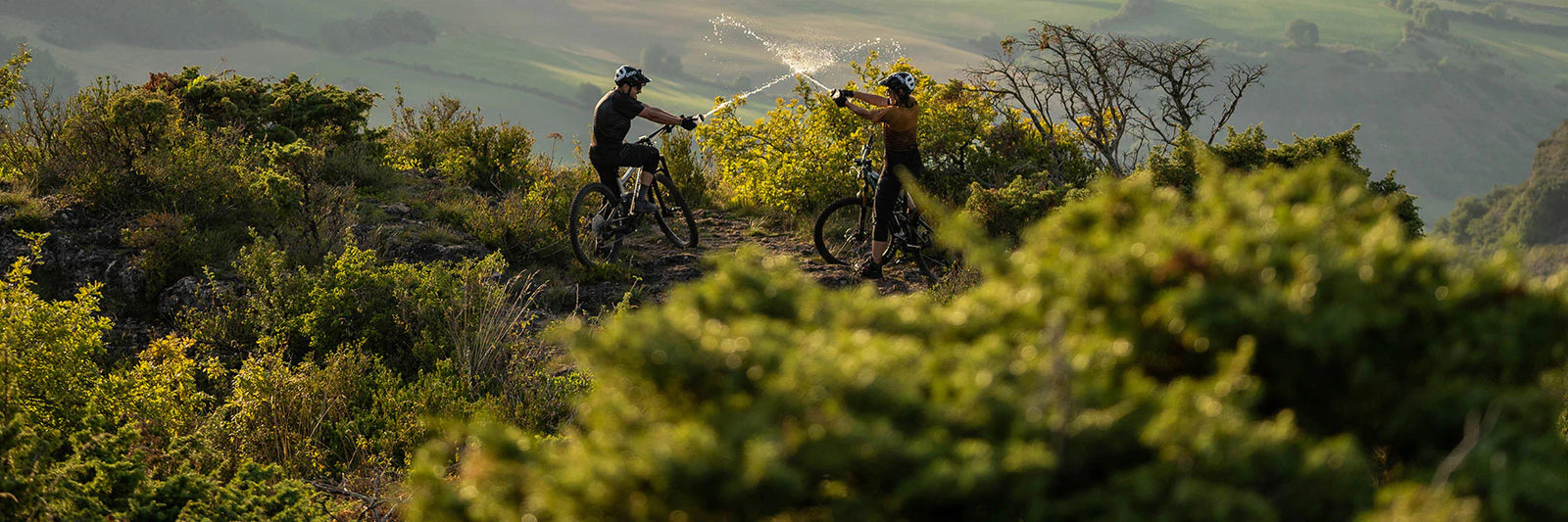 Two men riding Moustache electric bikes