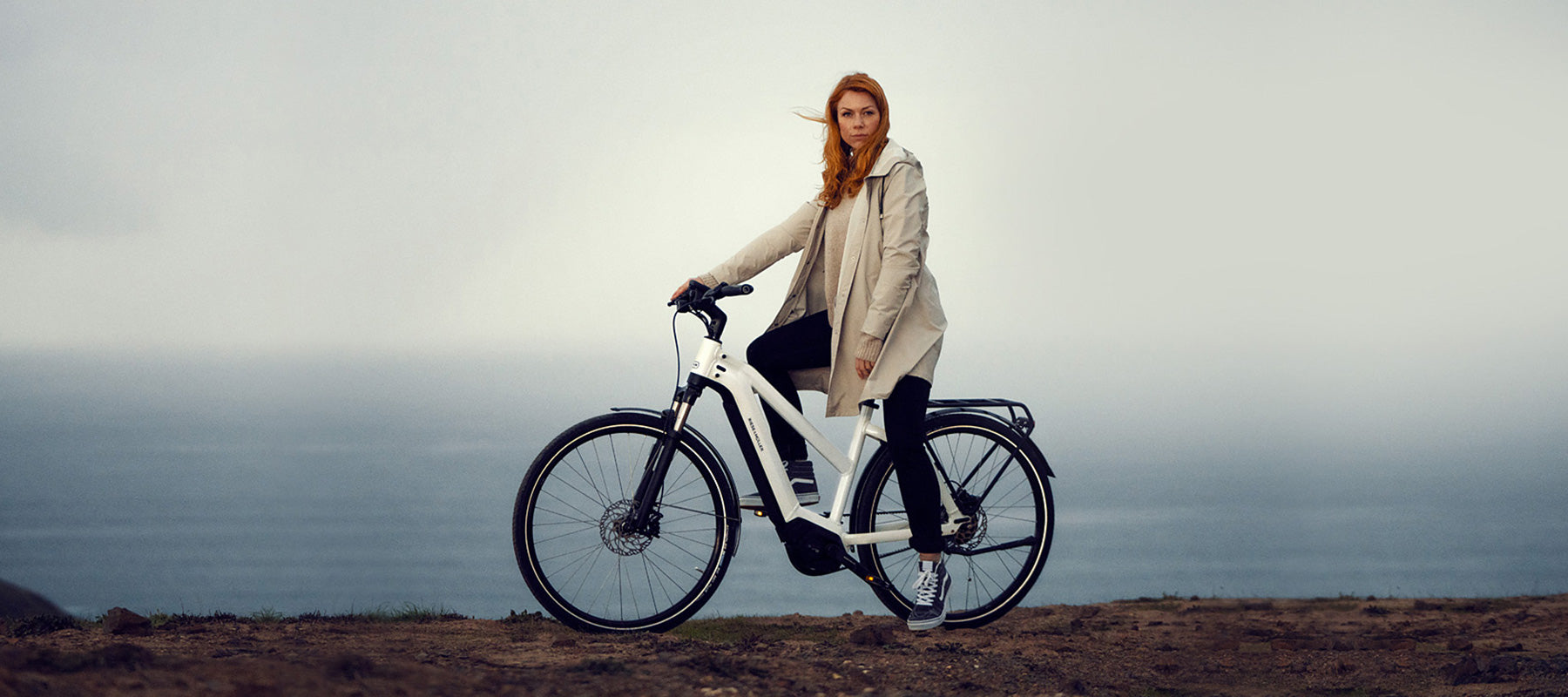Woman on a cycle-to-work scheme bike.