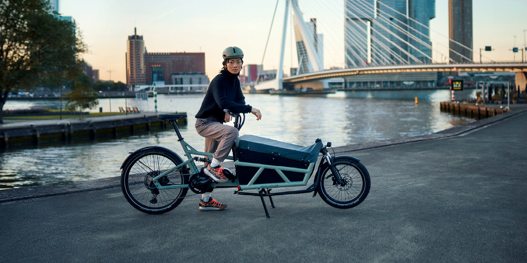 A woman with her Riese and Muller Load4 60 electric cargo bike