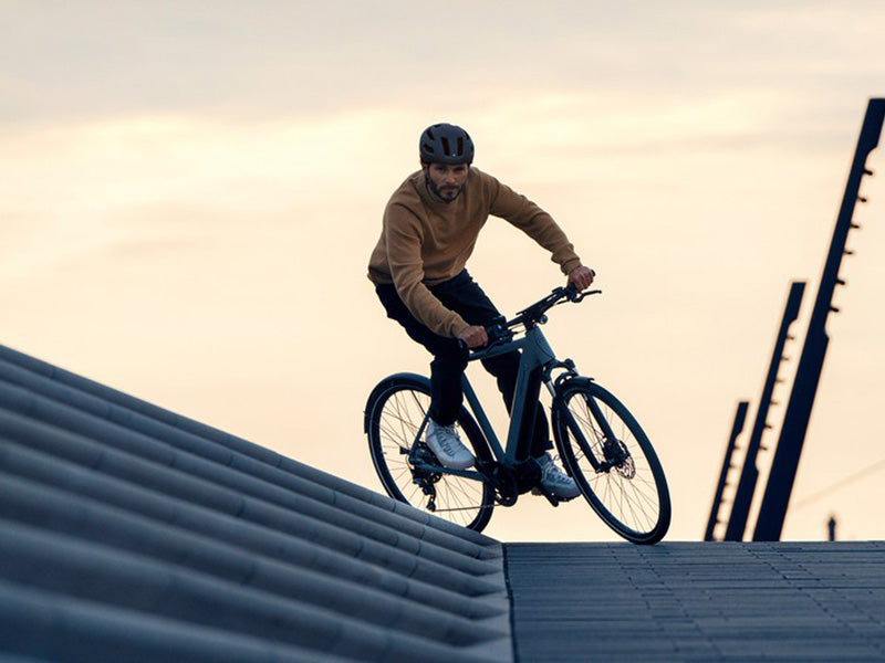 Man riding the Roadster by Riese and Muller.
